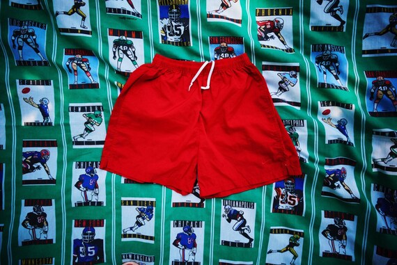 red nike soccer shorts