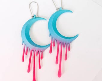 Pendientes de luna derretida: azul y rosa