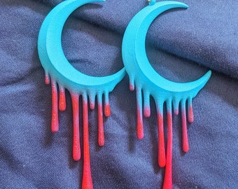 Pendientes de luna derretida: azul y rojo