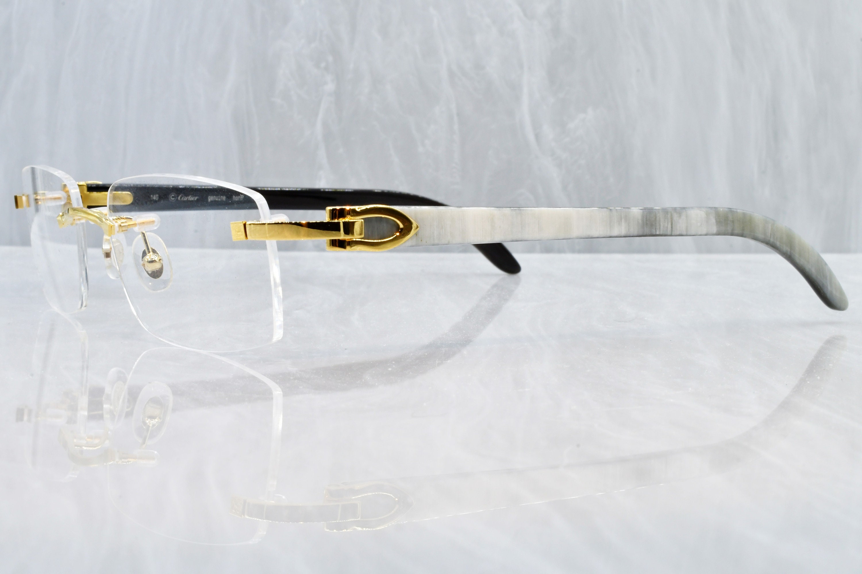 white cartier buffalo horn