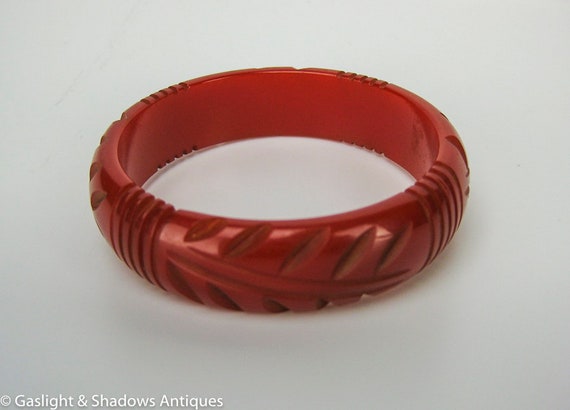 Red Carved Bakelite Vintage Bracelet Bangle - image 3