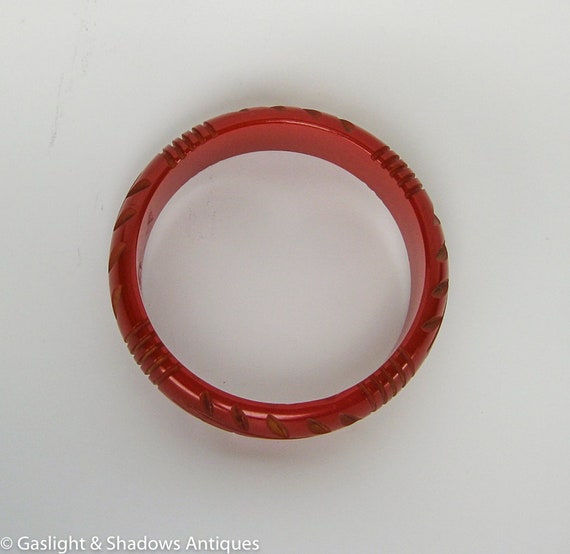 Red Carved Bakelite Vintage Bracelet Bangle - image 5