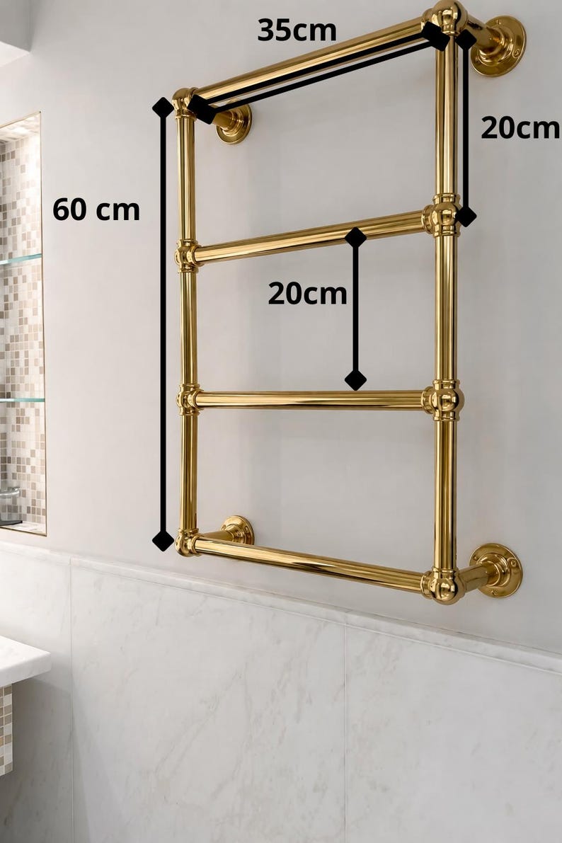 May include: A gold-colored towel rack, 23.6 inches tall and 13.8 inches wide, with three horizontal bars. The bars are spaced 7.9 inches apart. The rack is mounted on a white wall above a marble-tiled surface.