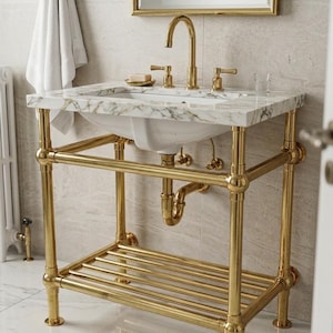 May include: A bathroom vanity featuring a white marble countertop with gold veining, supported by a polished gold metal pipe frame. The unit includes a gold faucet, two matching handles, a gold drain pipe, and a slatted gold metal shelf below.