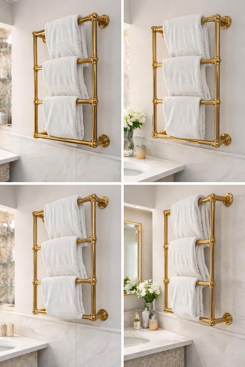May include: A gold-colored towel rack with three horizontal bars, holding folded white towels. The rack is mounted on a white wall, suggesting a bathroom setting. The design is classic and elegant.