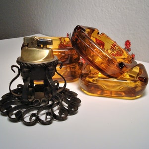 Vintage Working LIGHTER & (4) AMBER ASHTRAYS - Working Black Scroll-Wrought Iron Lighter and Set of (4) Square Amber Glass Ashtrays