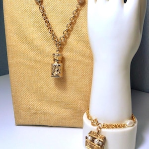 Vintage Carolee Potion Bottle Pendant Necklace & Judy Lee Treasure Chest Charm Bracelet Set