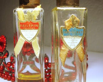 Vintage Lucien Lelong Perfume Bottles: Indiscret & Tailspin Cologne, Pair (1 FL OZ)