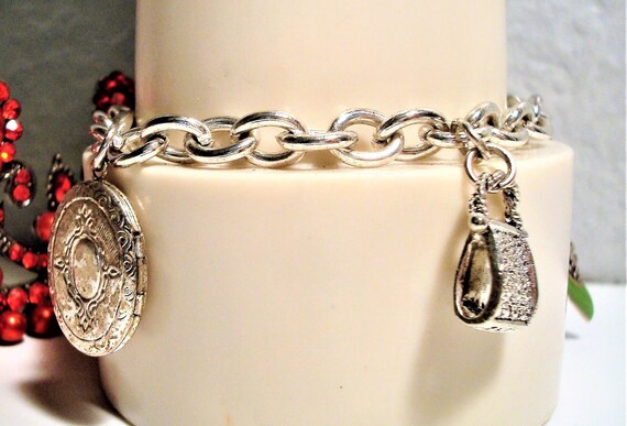 Miriam Haskell Charm Bracelet: Silvertone Locket,… - image 9