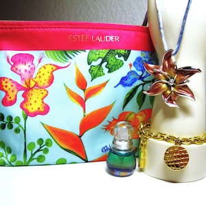 Vintage E.LAUDER PERFUME & ACCESSORIES - Estee Lauder Beyond Paradise Perfume, Rhinestone Flower Pendant - Tropical Pouch and Charm Bracelet