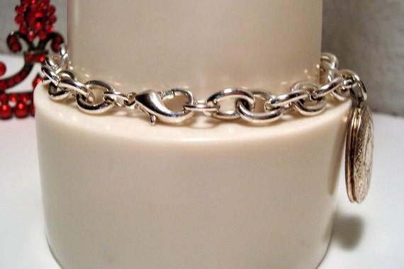 Miriam Haskell Charm Bracelet: Silvertone Locket,… - image 6