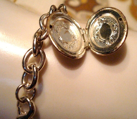 Miriam Haskell Charm Bracelet: Silvertone Locket,… - image 10