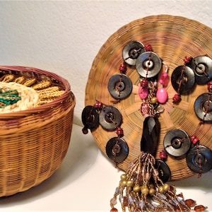 Vintage BASKET of RAFFIA TRIVETS - Hand-Crafted Ornate Bead/Tassel Lid Wicker Sewing Basket Topped w/ (6) Round Flower Design Raffia Trivets
