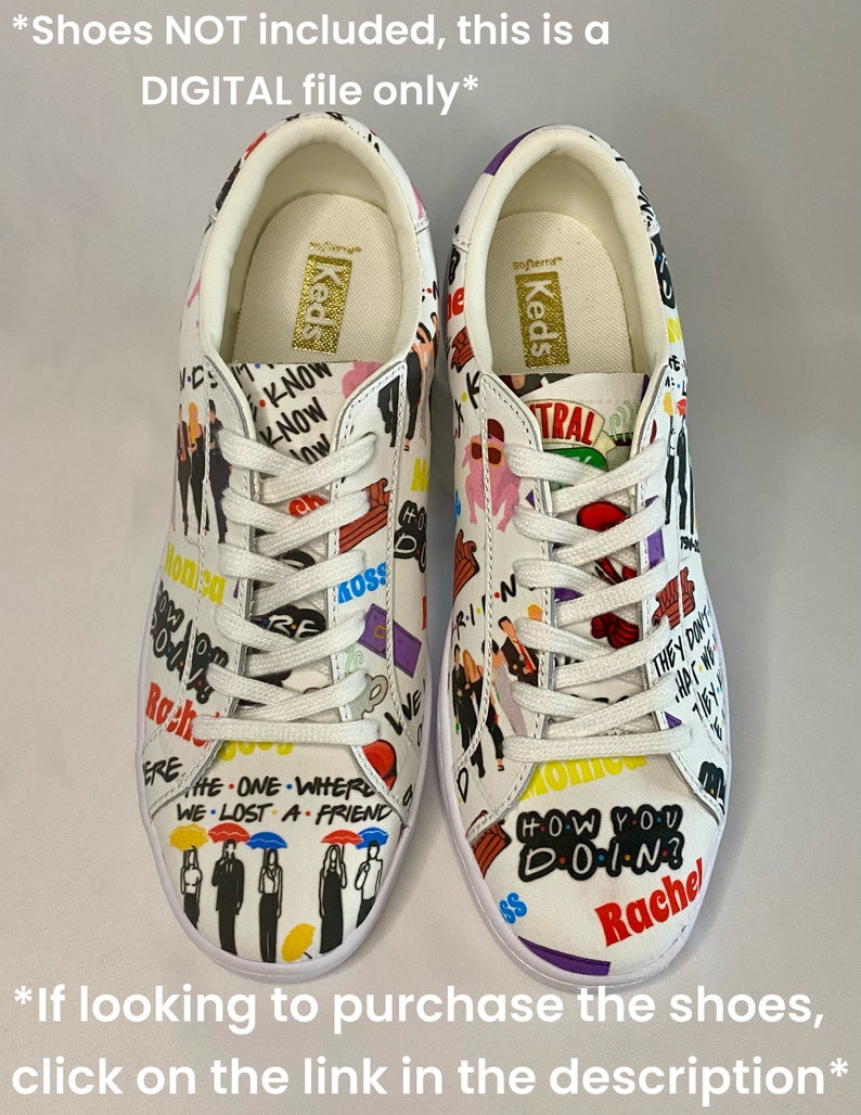 May include: A pair of white sneakers with a colorful print featuring characters and quotes from the TV show "Friends". The sneakers have a gold "Keds" logo on the tongue.