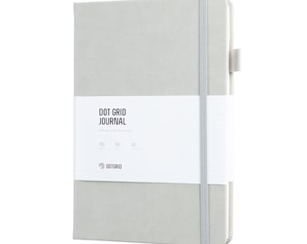 May include: A gray dot grid journal with a white label that says "DOT GRID JOURNAL" and has the text "160 pages, 180 gsm, acid free paper" and a logo that says "DOTGRID".