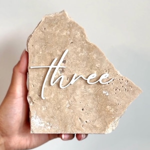 White And Beige Cursive Stone Table Numbers, Travertine Sign, White Acrylic Lettering, Natural Rock Table Number, Modern Wedding Signs Decor