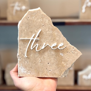 White And Beige Stone Table Numbers, Travertine Centerpiece, White Acrylic Lettering, Natural Rock Table Number, Modern Wedding Signs Decor