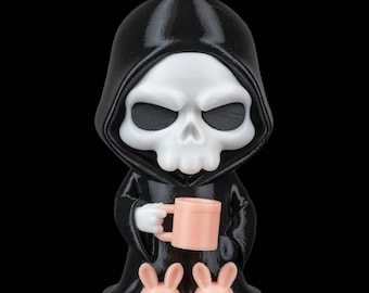 May include: A 3D-printed figurine of the Grim Reaper in a black hooded robe, holding a pink mug and wearing pink bunny slippers. The figure has a white skull face and is set against a black background.