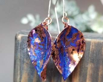Copper earrings, with a blue and purple patina.