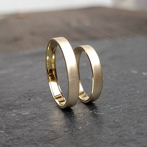 Narrow gold wedding rings