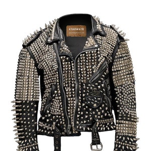 May include: A black leather jacket with silver studs and spikes. The jacket has a zipper closure and a label that reads "studwork".