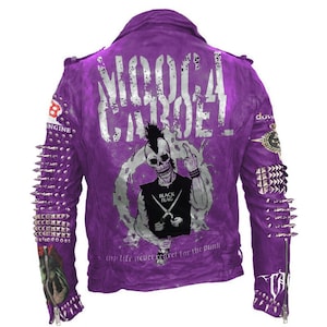 May include: Purple leather jacket with a punk rock design featuring a skull with a mohawk and the words "M.O.D.O.C.A. CAROE" and "My life never regret for the punk". The jacket has studded sleeves and a zip closure.