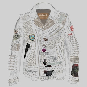 May include: White leather jacket heavily embellished with silver studs and patches. Features a studded collar, multiple zippers, and various patches including a skull, a police badge, and the word "SANTHROPY". The jacket has a "studwork" label.