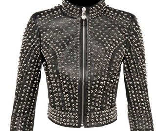 May include: A black leather jacket with silver studs. The jacket has a zipper closure and a stand-up collar.