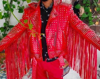 May include: A red leather jacket with silver studs and fringe. The jacket has a zip closure and a belt.