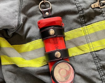 Firefighter inverted flashlight holder