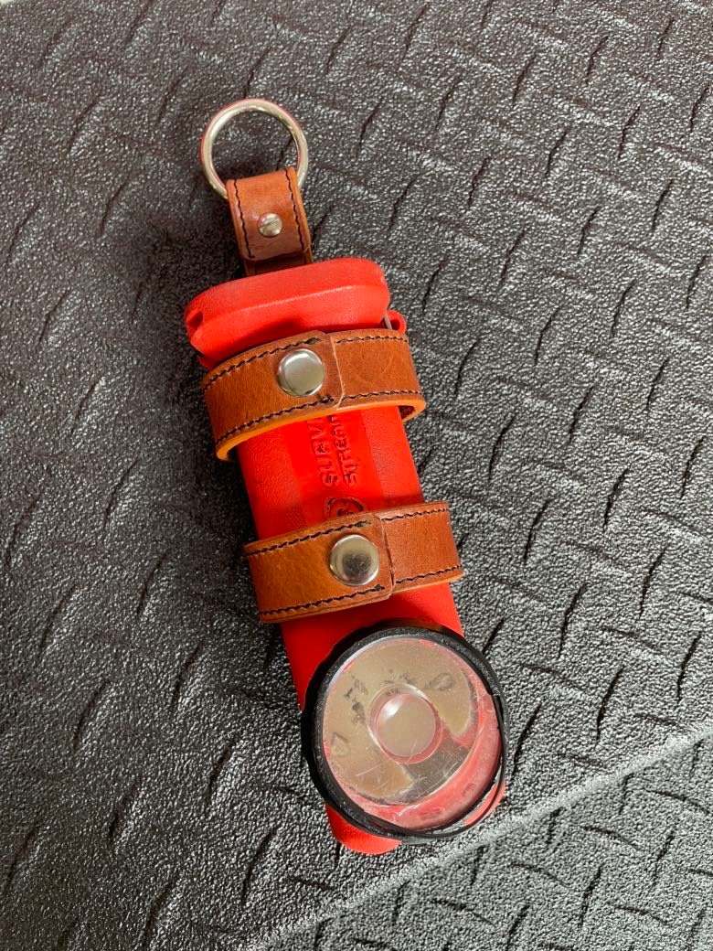 Firefighter inverted flashlight holder