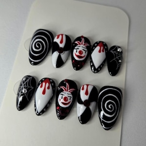 Presse de clown sur les ongles