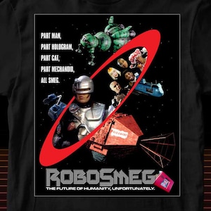 Pode incluir: Camiseta preta com um gráfico do filme Robosmeg. O design inclui um robô futurista, naves espaciais e o texto "ROBOSMEG" e "THE FUTURE OF HUMANITY, UNFORTUNATELY."