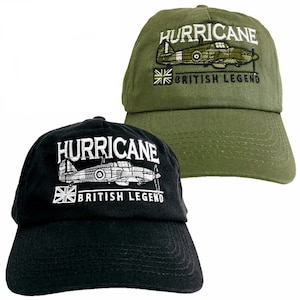 May include: Two baseball caps with embroidered designs. One cap is black with white embroidery and the other is green with white and green embroidery. Both caps feature a plane and the text "HURRICANE BRITISH LEGEND".