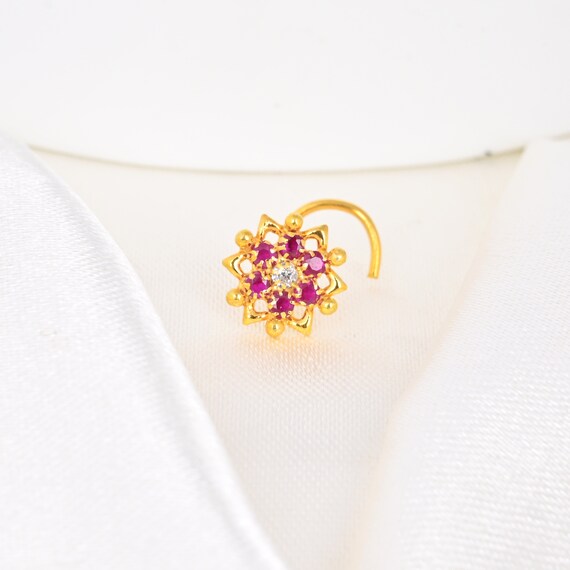 White stone hotsell gold nose pin
