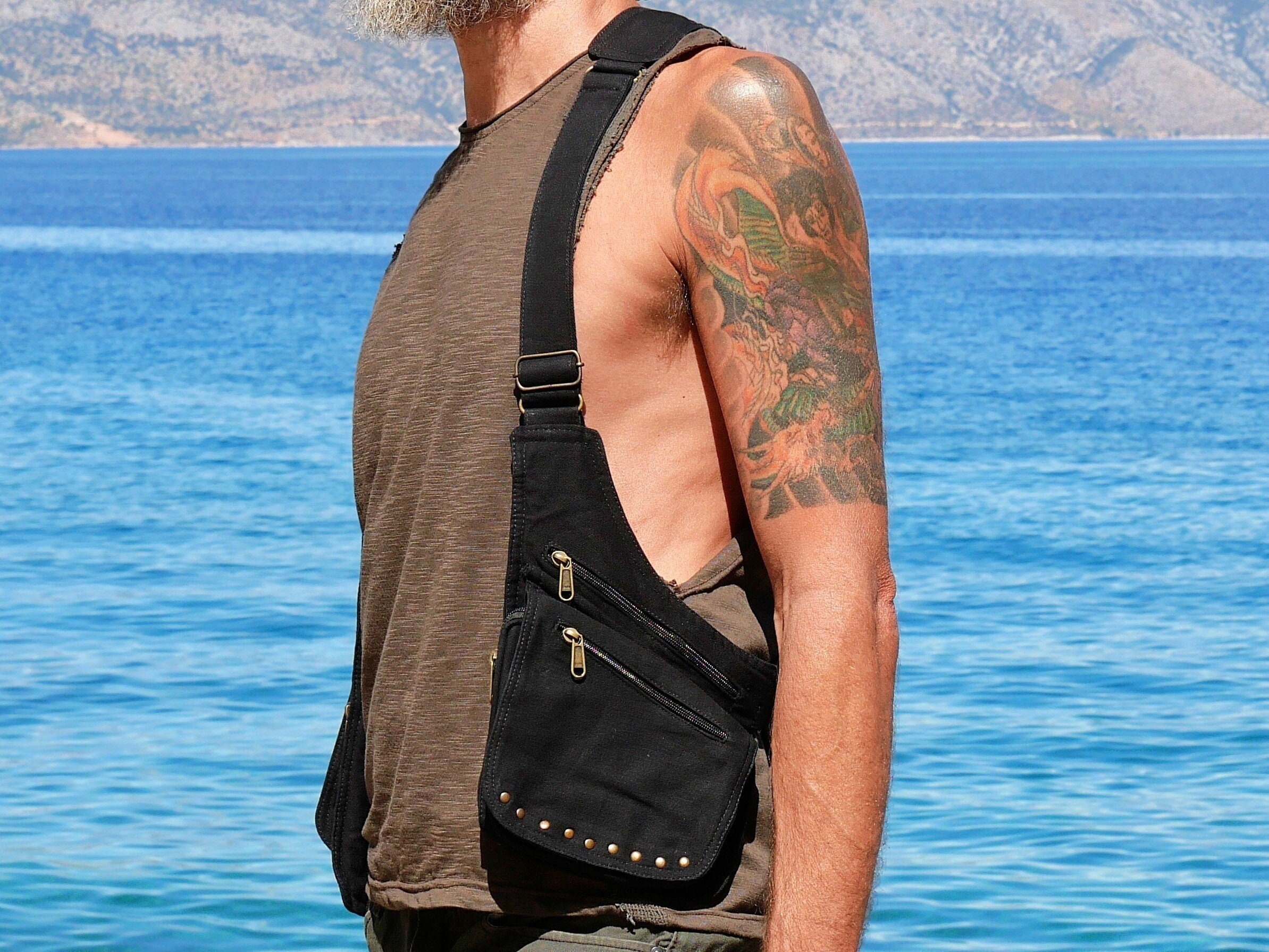 Holster ~ Utility vest with 6 pockets ~ Free size ~ Fully adjustable ~ Black with decorative studs ~ Unisex ~ The Hawk Holster