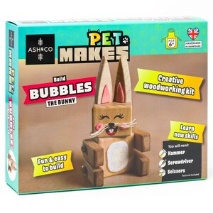 May include: A wooden craft kit to build a bunny named Bubbles. The kit includes all the pieces needed to assemble the bunny, along with instructions. The box is teal blue and features a picture of the finished bunny. The box also says "Pet Makes" and "Creative woodworking kit".