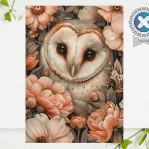 May include: A watercolor illustration of a barn owl surrounded by peach and cream-colored flowers. The owl has large, dark eyes and a heart-shaped face. The image has a soft, romantic feel, with a "Tested" badge in the upper right corner.