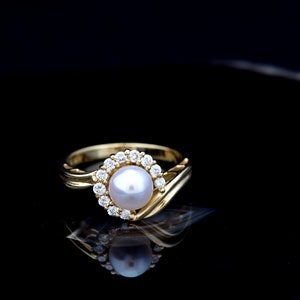 14 Karat Swirl Diamond Halo Pearl Ring
