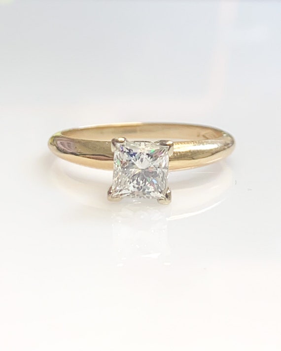 Estate .97 carat Princess cut H/Si2 Leo Diamond So