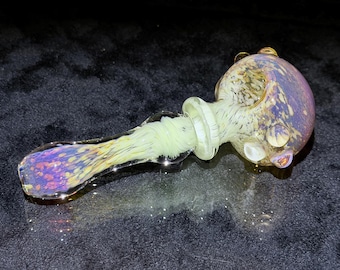 Sleek and stylish pocket pipe in minty white greens and transparent purples with multiple marias and clear lenses