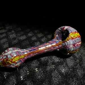 Old school style wrap and rake pocket pipe in reds and blues with hints of fume and streaks of yellow // fumed glass pipes //