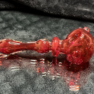 Sleek and stunning pocket pipe in rich transparent ruby/garnet and rusty blood reds