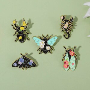 Unique Insect-Shaped with flowers Enamel Pin for Clothes, Bags, and Jewelry