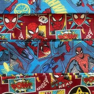May include: Multicolored fabric with a repeating pattern of Spiderman comic book illustrations. The fabric features red, blue, yellow, and black colors. The fabric includes the words "SPIDEY", "WEB-HEAD", "WALL CRAWLER", and "SPIDER-MAN".