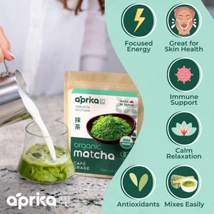 May include: A bag of organic matcha powder with a glass of matcha latte being poured. The bag is labeled "aprika organic matcha" and "Made in Japan". The image also includes icons for focused energy, skin health, immune support, calm relaxation, antioxidants, and mixes easily.