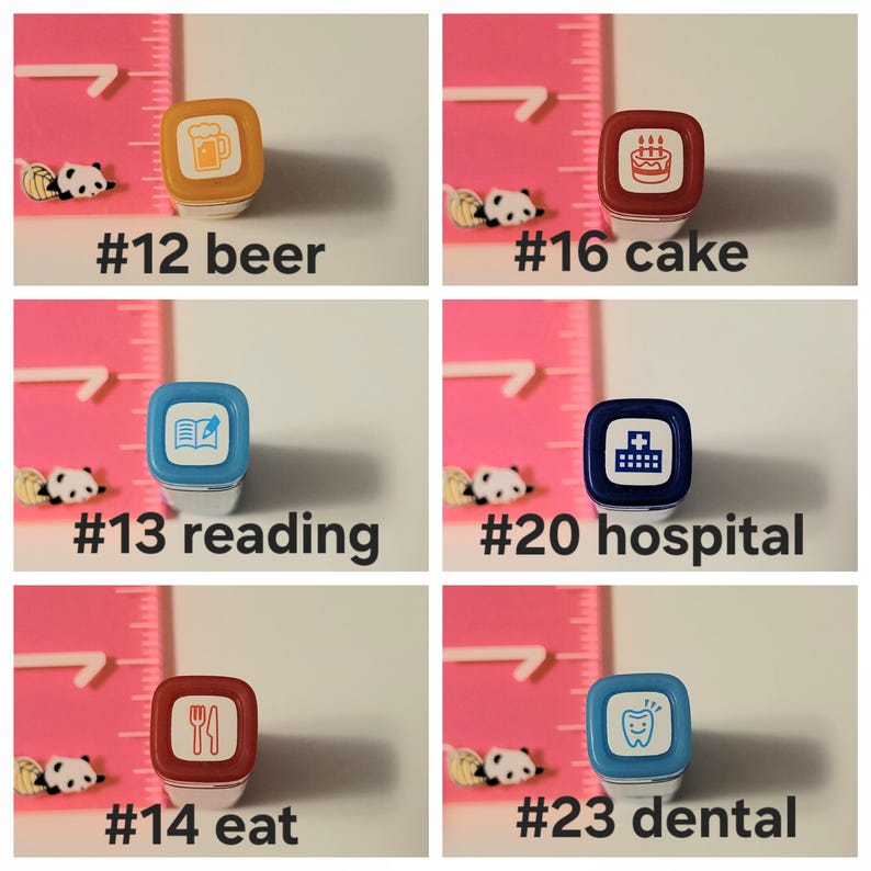 May include: A set of ten colorful rubber stamps with various images, including a beer mug, a cake, a book with a pen, a hospital building, a fork and knife, and a tooth. Each stamp is labeled with a number and a word describing the image.