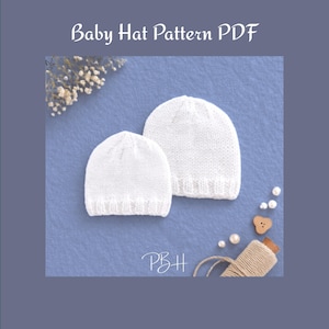 May include: Two white knitted baby hats are displayed on a blue surface. The hats are different sizes, suggesting a pattern for various ages. The text "Baby Hat Pattern PDF" is at the top. The initials "PBH" are at the bottom.
