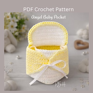 May include: A handmade crochet baby pocket in yellow and white, tied with a white ribbon. The pocket is open, revealing a white interior. The text "PDF Crochet Pattern Angel Baby Pocket" is at the top.
