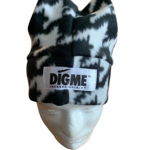 Cappello retrò in pile polare bianco e nero a quattro punte